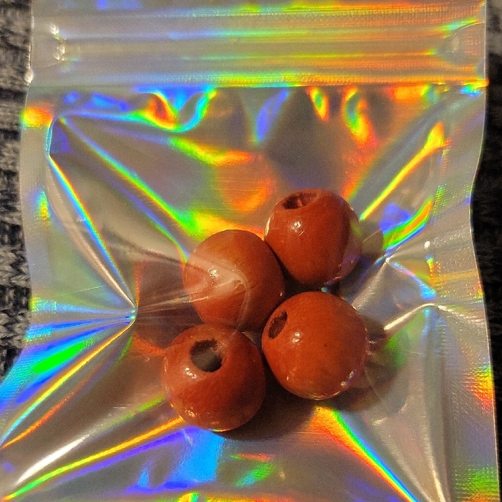 Set of Four Glossy Brown Or Orange Wooden Beads - Possibly Painted